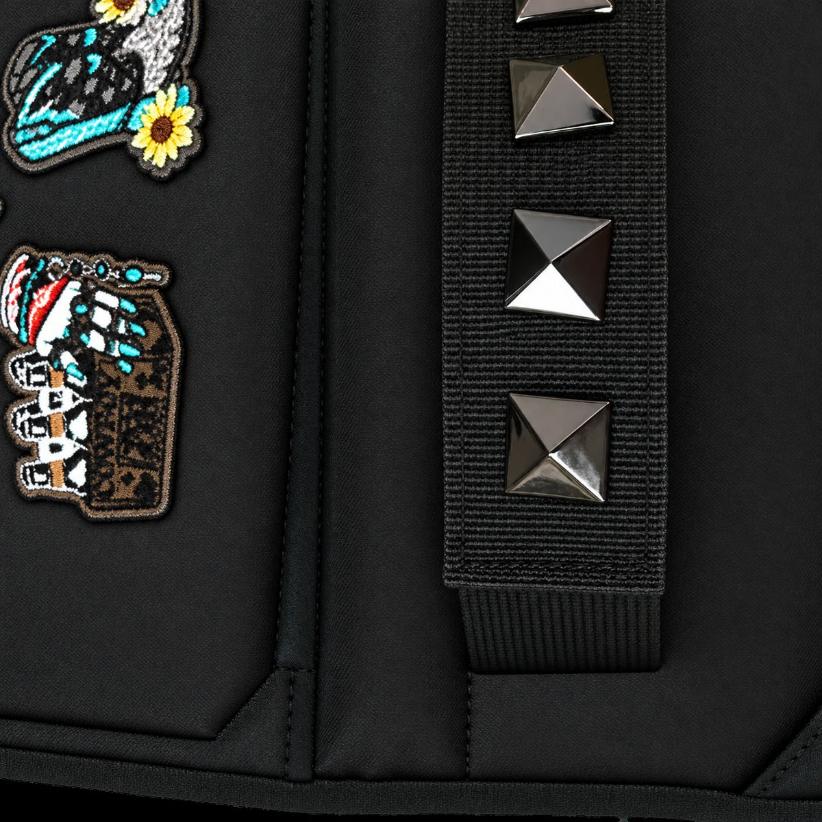 CarryColor Road Cowboy pyramid stud retention strap detail